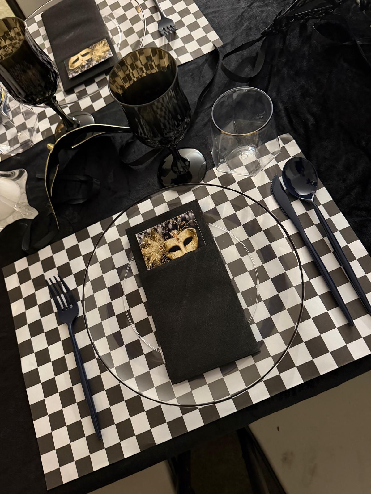 Checkered place setting with masquerade mask