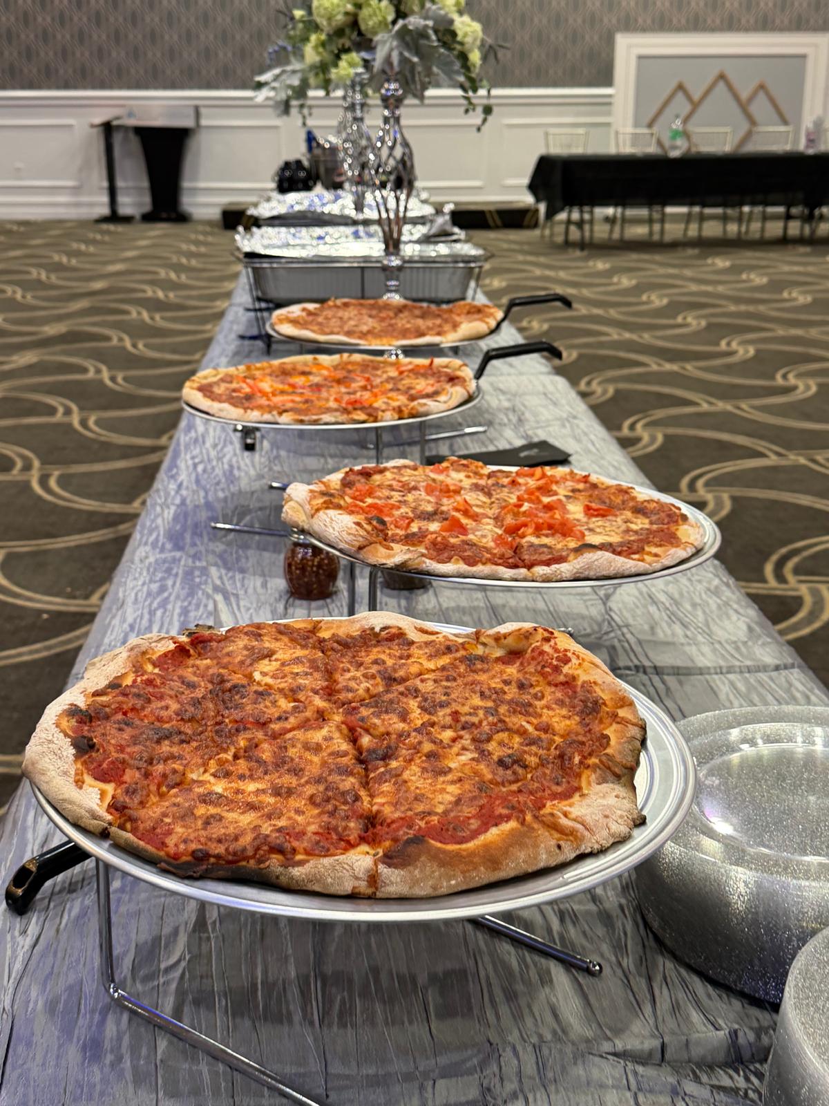 Pizza line buffet at a celebration