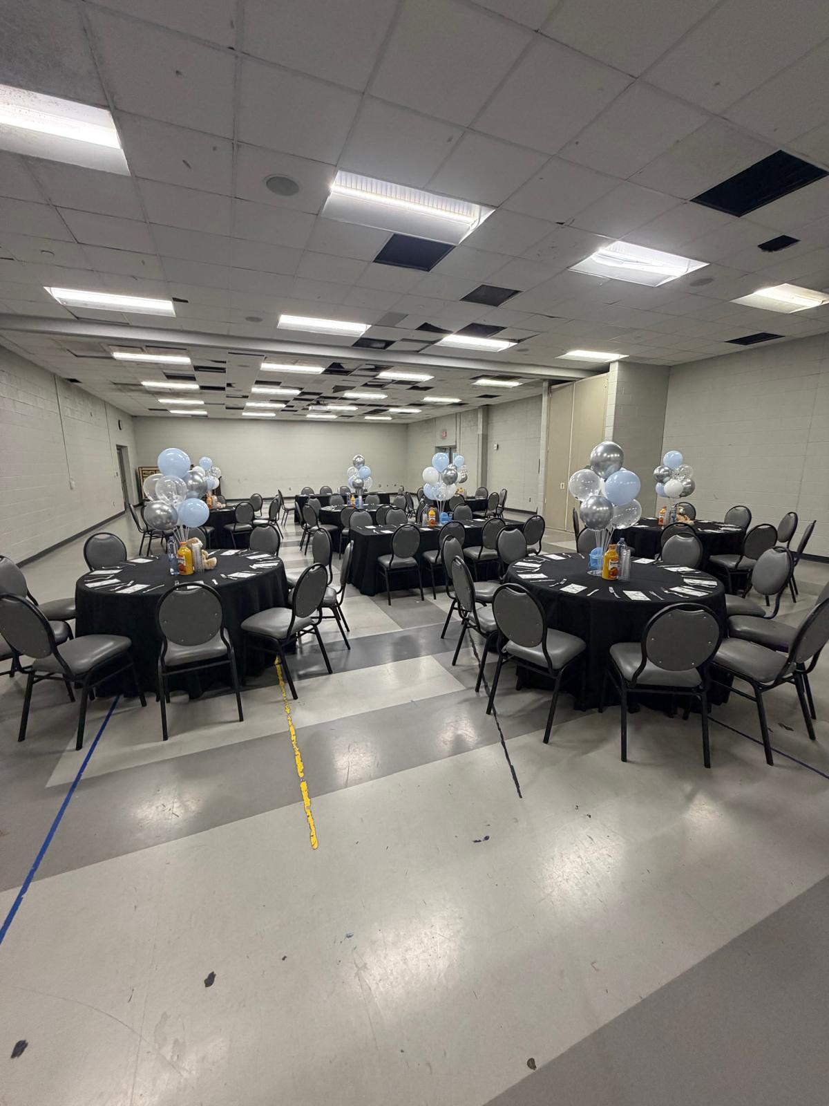 Hall set with balloon centerpieces